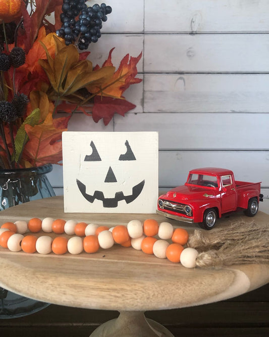 Tiered Tray block. White pumpkin face